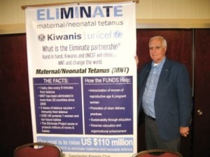 Joe Tolson with Eliminate MNT Banner