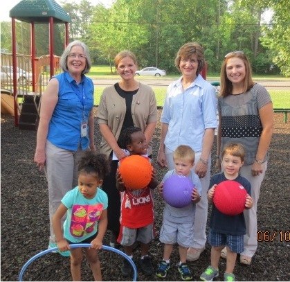 In front row, left to right, are Nina Vasquez, Kwan Davis, Brock Smith, and Tommy Meredith. In back, from left to right, are Patty Campbell, Anderson County Health Department nutritionist; Terry Frank, Anderson County mayor; Terry Peek, director of the Emory Valley Early Learning Center; and Jennifer Enderson, president of the Emory Valley Center. (Photo courtesy of Anderson County Health Department)
