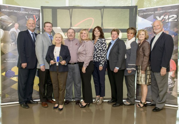 Scientific Sales Inc. was recently honored as a small business of the year by Consolidated Nuclear Security LLC. Shown in the photo are CNS Supply Chain Manager Skip Skelton, CNS Vice President and Y-12 Site Manager Bill Tindal, SSI President and Owner Vicki Dyer, SSI Sales Manager Wendi Arnold, SSI Sales Representative Cynthia Bullard, SSI Customer Service Representative Mike Buschman, CNS Vice President of Mission Assurance Linda Bauer, CNS Subcontract Administrator Annette Pickel, CNS Program Manager for Socioeconomic Programs Lisa Copeland, and CNS Vice President of Operations Support Darrell Graddy. (Photo by CNS Y-12)