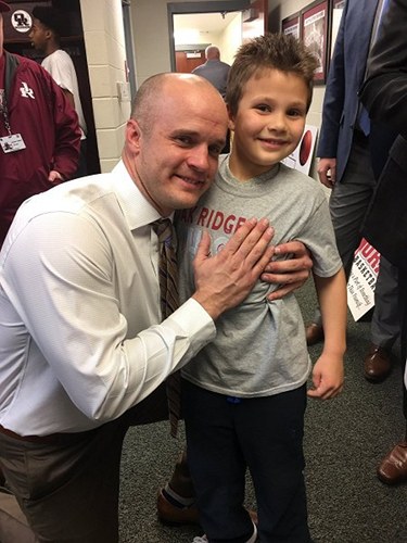 AJ Cucksey meets Oak Ridge Coach Aaron Green during a 68-38 win for the Wildcats over West during a Region 2-AAA quarterfinal game at Wildcats Arena on Saturday, Feb. 25, 2017. (Photo courtesy Prayers for AJ/Stephanie Thompson)