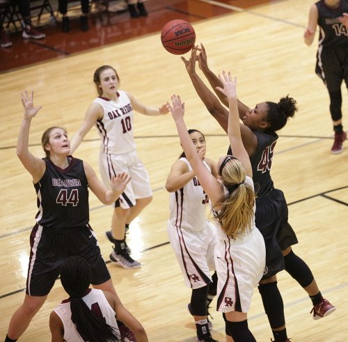The Oak Ridge Lady Wildcats defend Bearden freshman Jakhyia Davis (42) during a 62-56 win over Bearden in a Region 2-AAA quarterfinal elimination game at Wildcat Arena on Friday, Feb. 24, 2017. (Photo by Luther Simmons)