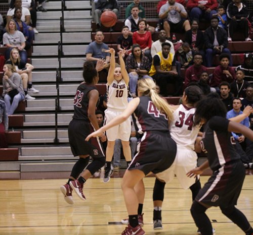 Oak Ridge senior Courtney Ellison (10) shoots from three-point range during a 62-56 win over Bearden in a Region 2-AAA quarterfinal elimination game at Wildcat Arena on Friday, Feb. 24, 2017. (Photo by Luther Simmons)