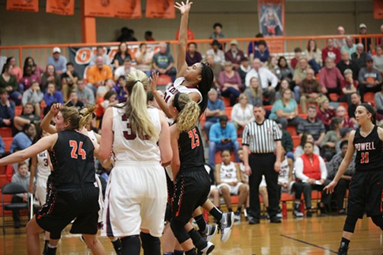 Oak Ridge sophomore Jada Guinn (24), at center, scored 16 points for the Lady Wildcats during a 59-34 win over Powell at Clinton in the District 3-AAA championship at Clinton on Tuesday, Feb. 21, 2017. (Photo by Luther Simmons)