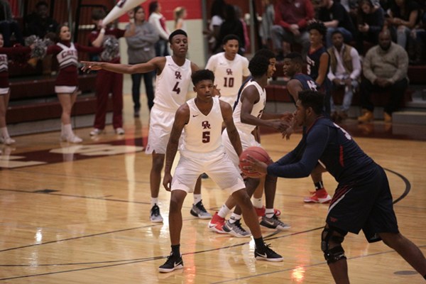The Oak Ridge Wildcats play defense against West during a 68-38 Region 2-AAA quarterfinal win for the Wildcats at home on Saturday, Feb. 25, 2017. (Photo by Luther Simmons)