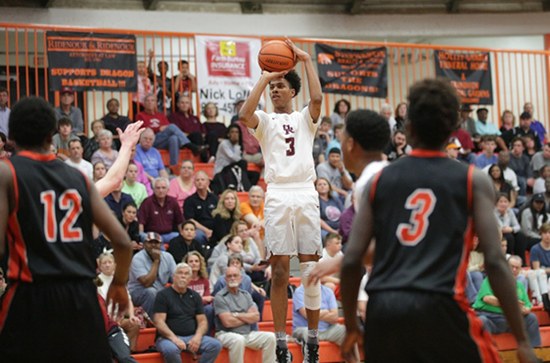 Named most valuable player, Oak Ridge senior Tajion Jones (3) scored 21 points, with 12 of those on three-point shots, during an 86-58 win over Powell in the District 3-AAA championship at Clinton High School on Tuesday, Feb. 21, 2017. (Photo by Luther Simmons)