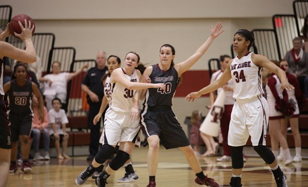 Oak Ridge juniors Destiny Kassner (30) and Mykia Dowdell (34) play defense against Bearden in a 62-56 win over the Lady Bulldogs in a Region 2-AAA quarterfinal elimination game at Wildcat Arena on Friday, Feb. 24, 2017. (Photo by Luther Simmons)