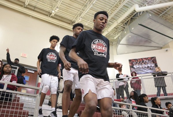 Oak Ridge Wildcat seniors are pictured above before a 68-38 Region 2-AAA quarterfinal win against West at home on Saturday, Feb. 25, 2017. From right, they are Tyshawn Young, Tee Higgins, and Tajion Jones.(Photo by Luther Simmons)
