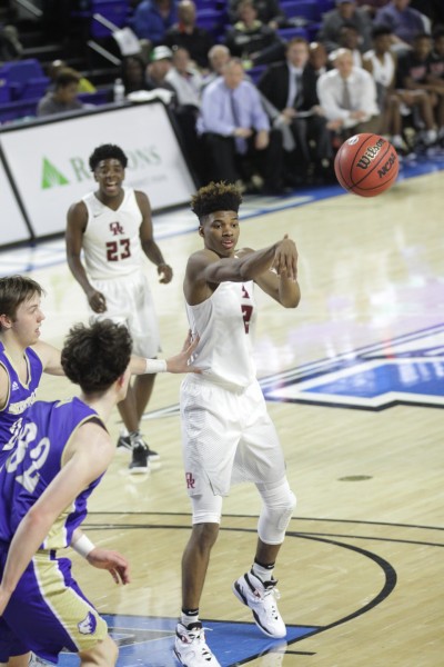 Oak Ridge senior E.J. Bush (2), who had been sidelined for several months with a knee injury, passes during a 53-45 win over Brentwood in a Class AAA boys' state quarterfinal game at Murphy Center in Murfreesboro on Wednesday, March 15, 2017. (Photo by Luther Simmons)