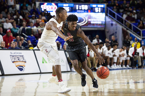 Oak Ridge senior Anthony Gibson (23) drives against Memphis East during a 63-60 loss for the Wildcats in a Class AAA boys' state semifinal game at Murphy Center in Murfreesboro on Friday, March 17, 2017. (Photo by Kindell Moore)