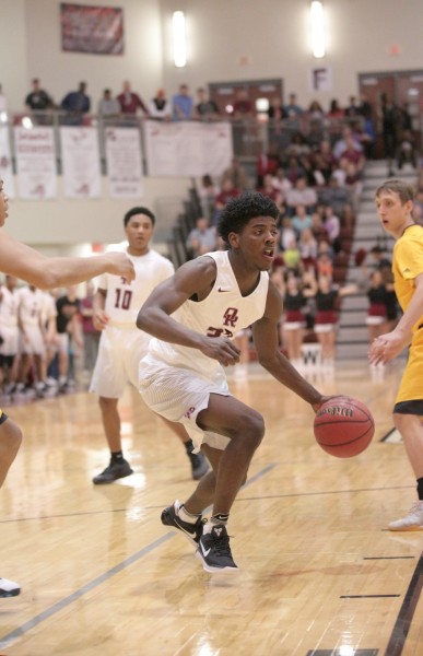 Oak Ridge senior Anthony Gibson (23), who scored 22 points, drives against David Crockett during a 90-60 win for the Wildcats in a Class sectional at Wildcat Arena on Monday, March 6, 2017. (Photo by Luther Simmons)