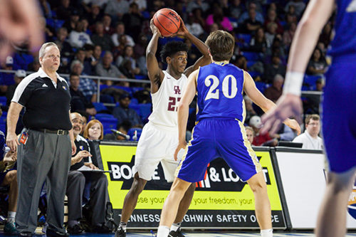 Oak Ridge senior Anthony Gibson (23) looks for a pass against Brentwood during a 53-45 win for the Wildcats in a Class AAA boys' state quarterfinal game at Murphy Center in Murfreesboro on Wednesday, March 15, 2017. (Photo by Kindell Moore)