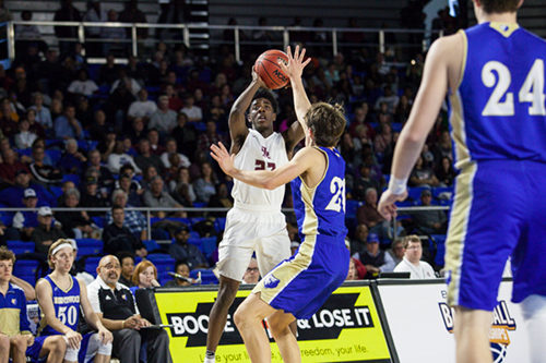 Oak Ridge senior Anthony Gibson (23) shoots against Brentwood during a 53-45 win for the Wildcats in a Class AAA boys' state quarterfinal game at Murphy Center in Murfreesboro on Wednesday, March 15, 2017. (Photo by Kindell Moore)