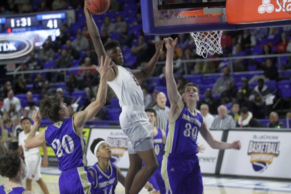 Oak Ridge senior Tee Higgins (5) had two dunks during a 53-45 win over Brentwood in a Class AAA boys' state quarterfinal game at Murphy Center in Murfreesboro on Wednesday, March 15, 2017. (Photo by Luther Simmons)