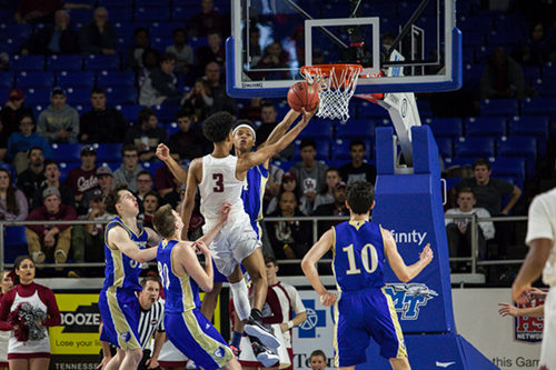 Oak Ridge senior Tajion Jones (3) drives to the basket during a 53-45 win over Brentwood in a Class AAA boys' state quarterfinal game at Murphy Center in Murfreesboro on Wednesday, March 15, 2017. (Photo by Kindell Moore)