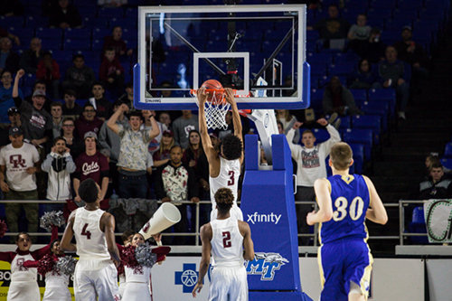 Oak Ridge senior Tajion Jones (3) dunks during a 53-45 win over Brentwood in a Class AAA boys' state quarterfinal game at Murphy Center in Murfreesboro on Wednesday, March 15, 2017. (Photo by Kindell Moore)