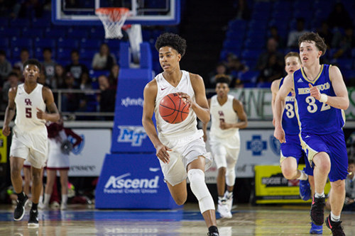 Oak Ridge senior Tajion Jones (3) dribbles the basketball in transition during a 53-45 win over Brentwood in a Class AAA boys' state quarterfinal game at Murphy Center in Murfreesboro on Wednesday, March 15, 2017. (Photo by Kindell Moore)