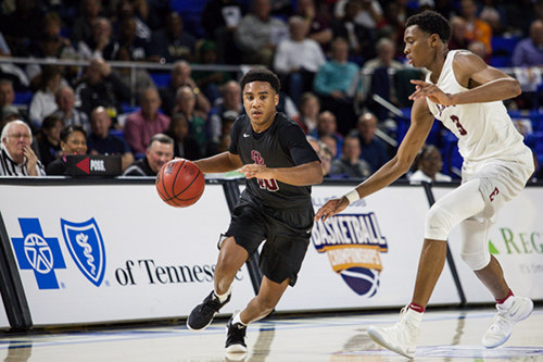 Oak Ridge junior point guard Levert Smith (10) drives against Memphis East sophomore Chandler Lawson (3) during a 63-60 loss for the Wildcats in a Class AAA boys' state semifinal game at Murphy Center in Murfreesboro on Friday, March 17, 2017. (Photo by Kindell Moore)