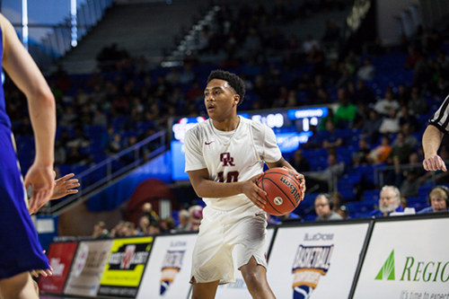 Oak Ridge junior Levert Smith (10) looks for a pass against Brentwood during a 53-45 win for the Wildcats in a Class AAA boys' state quarterfinal game at Murphy Center in Murfreesboro on Wednesday, March 15, 2017. (Photo by Kindell Moore)