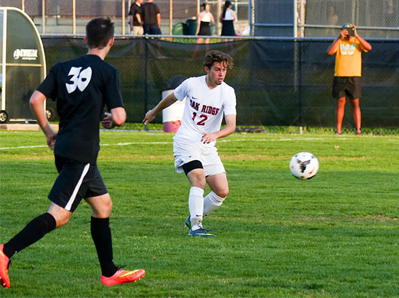 Oak Ridge junior midfielder Casey Nigh (12) passes during a 6-0 win over Powell at the Oak Ridge Soccer Complex on Tuesday, April 11, 2017. (Photo by John Huotari/Oak Ridge Today)