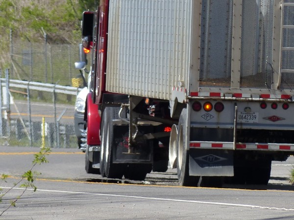 The truck trailer hit by the four-door sedan in a fatal crash on State Route 95 on Monday, April 10, 2017, appeared to have a tire that was damaged or missing, although it wasn't immediately clear if that was because of the crash. (Photo by John Huotari/Oak Ridge Today)