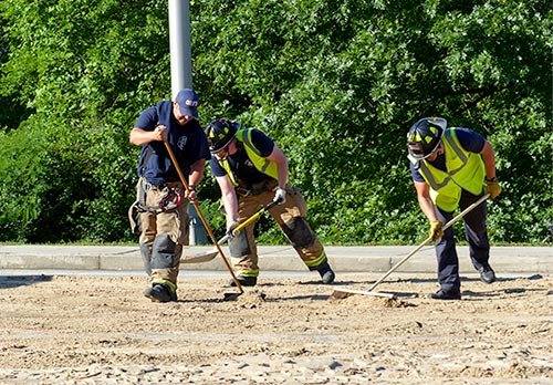 South Illinois Avenue remained closed early Friday afternoon, May 26, 2017, after about 100 gallons of diesel fuel spilled onto the road following a crash involving a dump truck and two vehicles at Lafayette Drive/Scarboro Road in south Oak Ridge. (Photo by John Huotari/Oak Ridge Today)