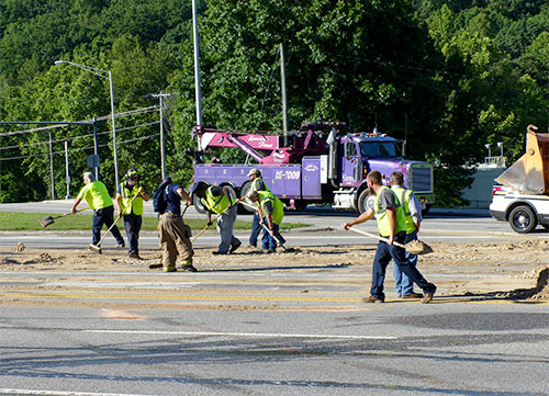 South Illinois Avenue remained closed early Friday afternoon, May 26, 2017, after about 100 gallons of diesel fuel spilled onto the road following a crash involving a dump truck and two vehicles at Lafayette Drive/Scarboro Road in south Oak Ridge. (Photo by John Huotari/Oak Ridge Today)