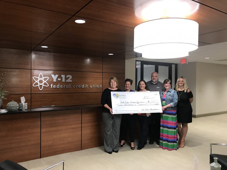 Pictured above from left to right during a check presentation to Oak Ridge Computer Science Girls photo are Amber Price, Y-12 FCU Gives Foundation; Emily Gibson, Katharine Page, and Thomas Proffen of Oak Ridge Computer Science Girls (ORCS Girls); and Janie Click and Stephanie Zuleger, Y-12 FCU Gives Foundation. (Photo by Y-12 Federal Credit Union)