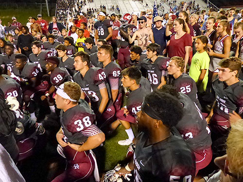 Oak Ridge Wildcats listen to Coach Joe Gaddis after a 21-20 win over Hardin Valley on Blankenship Field on Friday, Aug. 18, 2017. (Photo by John Huotari/Oak Ridge Today)