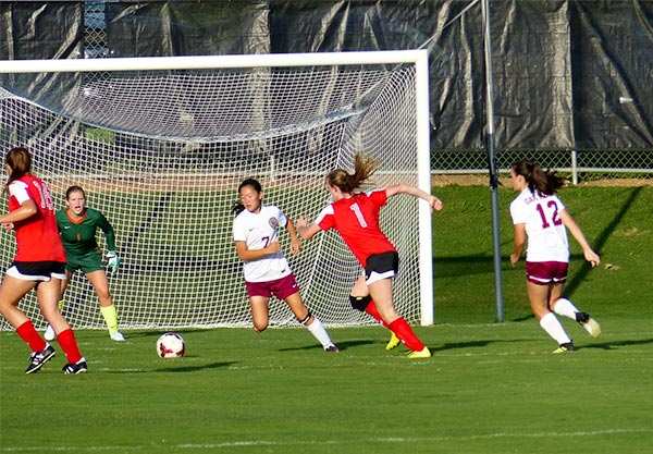 Oak Ridge players pictured above from left to right during a 8-0 win over Halls at home on Thursday, Aug. 17, 2017, are junior goalkeeper Laura Snyder (1), freshman Izzy Wang (7), and freshman Lilah Brown (12). (Photo by John Huotari/Oak Ridge Today)