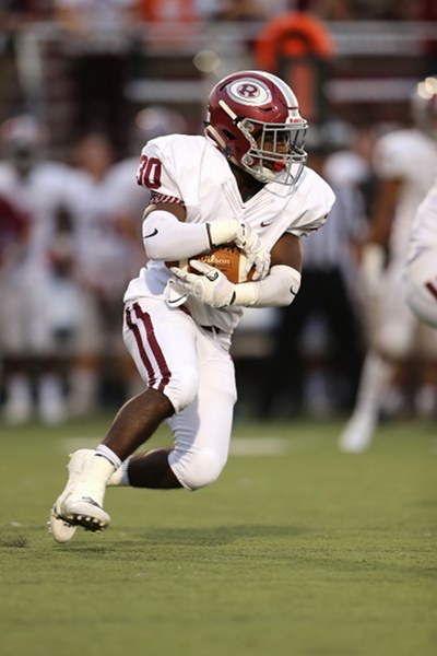Above, Oak Ridge junior Jordan Graham (30) runs against Dobyns-Bennett in Kingsport on Friday, Aug. 25, 2017. (Photo by Allen Greene Photography)