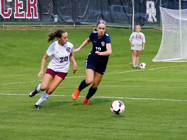 Pictured above during a 2-1 win over West at Oak Ridge High School on Tuesday, Sept. 12, 2017, is freshman Alyssa Tittsworth (20). (Photo by John Huotari/Oak Ridge Today)