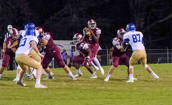 Senior quarterback Johnny Stewart (2) looks for a pass as Wildcats block Karns during a 49-3 homecoming win for Oak Ridge on Blankenship Field on Friday, Sept. 29, 2017. (Photo by John Huotari/Oak Ridge Today)