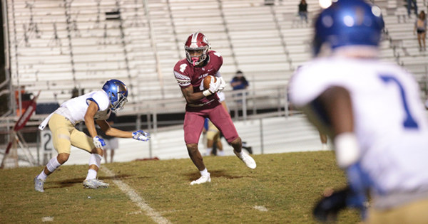 Oak Ridge senior wide receiver Caleb Martin (4) makes a catch against Karns during a 49-3 homecoming win for the Wildcats on Blankenship Field on Friday, Sept. 29, 2017. (Photo by Luther Simmons)