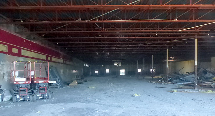 Construction work has started at the new American Museum of Science and Energy at Main Street Oak Ridge. Interior demolition work is under way, and exterior demolition work could start Wednesday. A crew was working at the new AMSE location on Friday, Jan. 5, 2018. (Photo by John Huotari/Oak Ridge Today)
