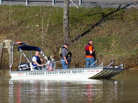 Rescuers in an Anderson County Rescue Squad boat search for a missing man in the water at Bull Run Park in Claxton, authorities said Sunday afternoon, Feb. 18, 2018. At center is Rescue Squad Chief Terry Allen. (Photo by John Huotari/Oak Ridge Today)