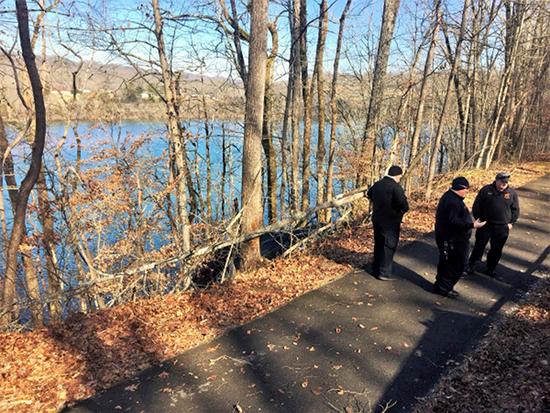 No injuries were reported after a car crashed off the side of the road above the Clinch River on Melton Lake Drive near Rivers Run Boulevard on Friday afternoon, Feb. 2, 2018, authorities said. (Photo by Oak Ridge Police Department)