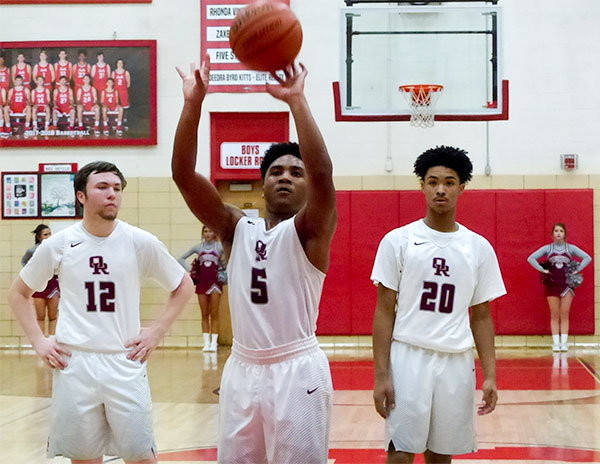 Levert Smith (5) of Oak Ridge during a District 3-AAA semifinal game against Anderson County at Halls on Friday, Feb. 16, 2018. Behind him is Joe Kesterson (12) and Isaiah Johnson (20). (Photo by John Huotari/Oak Ridge Today)