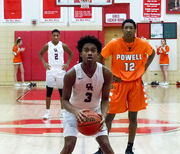 Javonte Thomas (3) of Oak Ridge shoots a free throw during a 60-58 loss to Powell in the District 3-AAA championship at Halls on Saturday, Feb. 17, 2018. Behind him is Josh Woods (12) of Powell. (Photo by John Huotari/Oak Ridge Today)