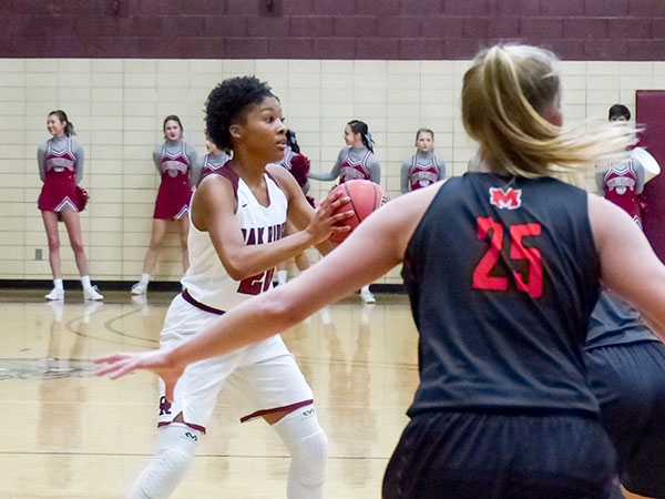 Oak Ridge senior Desiree Bates (20) looks for a pass against Maryville during a 40-35 Region 2-AAA semifinal win for the Lady Wildcats at Bearden on Monday, Feb. 26, 2018. (Photo by John Huotari/Oak Ridge Today)