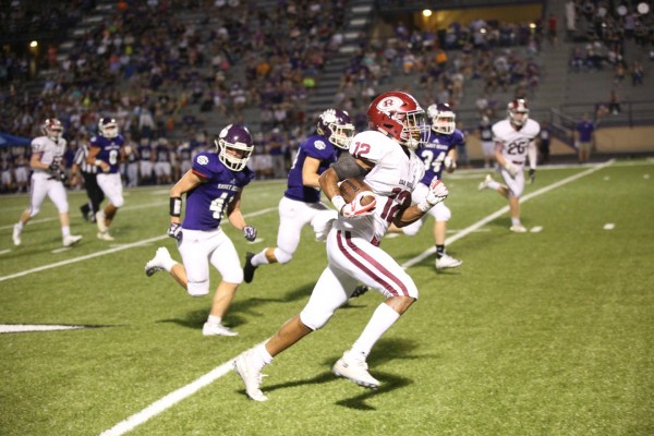 Oak Ridge senior Kai'Reese Pendergrass (12) runs during a 41-13 win at Sevier County on Friday, Sept. 21, 2018. (Photo by Luther Simmons)
