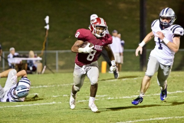 Oak Ridge senior Jordan Graham (8) runs during a 20-14 loss to Farragut on Blankenship Field on Friday, Sept. 7, 2018. (Photo by Barry Houchin)