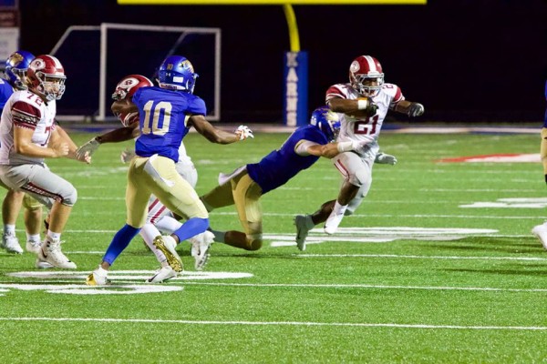 Oak Ridge junior Tyrell Romano (21) runs the football during a 48-7 win at Karns on Friday, Sept. 28, 2018. (Photo by Barry Houchin)