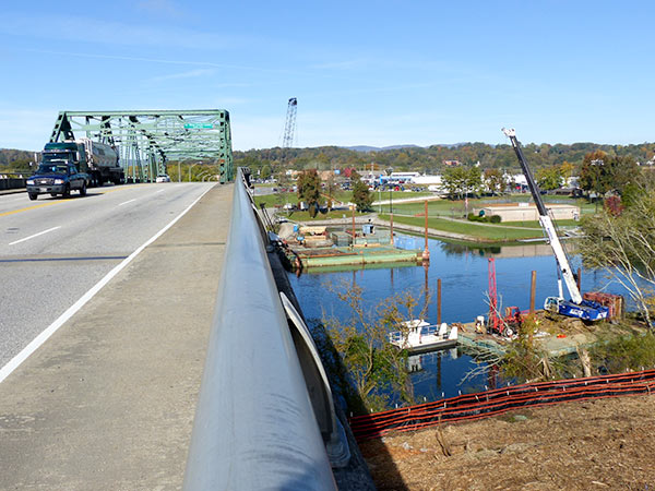 Work is under way on the bridge to replace the Honorable William Everette Lewallen Bridge over the Clinch River on Clinch Avenue between downtown Clinton and South Clinton. The work is pictured above on Tuesday, Oct. 30, 2018. (Photo by John Huotari/Oak Ridge Today)