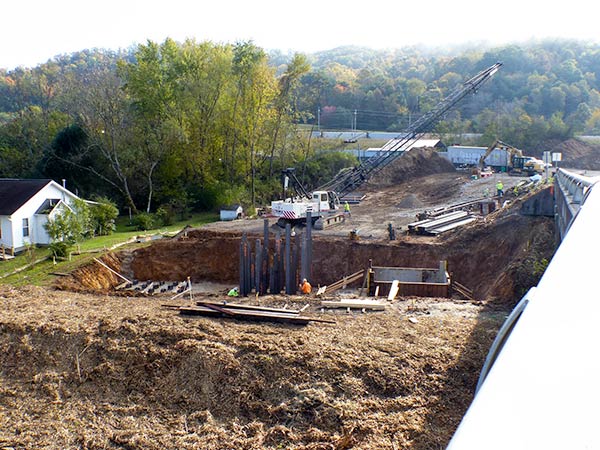Work is under way on the bridge to replace the Honorable William Everette Lewallen Bridge over the Clinch River on Clinch Avenue between downtown Clinton and South Clinton. The work is pictured above on Tuesday, Oct. 30, 2018. (Photo by John Huotari/Oak Ridge Today)