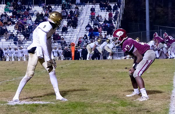 Catholic senior wide receiver Adam Jones (9), son of former Tennessee Vols coach Butch Jones, lines up against Oak Ridge senior cornerback and quarterback Herbert Booker (13) during a 42-40 win for the Fighting Irish in a Class 5A quarterfinal game on Blankenship Field on Friday, Nov. 16, 2018. (Photo by John Huotari/Oak Ridge Today)