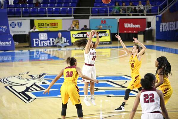 Oak Ridge junior Bri Dunbar (12) shoots a three-point shot during a 65-49 win over Science Hill in a Class AAA girls basketball tournament quarterfinal game in Murphy Center at Middle Tennessee State University in Mufreesboro on Thursday, March 7, 2019. (Photo by Luther Simmons)