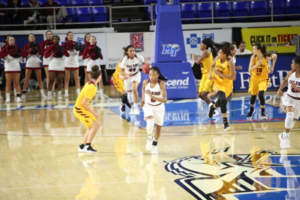 Oak Ridge senior Jada Guinn (24) dribbles the basketball out of the back court during a 65-49 win for the Lady Wildcats over Science Hill in a Class AAA girls basketball tournament quarterfinal game in Murphy Center at Middle Tennessee State University in Mufreesboro on Thursday, March 7, 2019. (Photo by Luther Simmons)