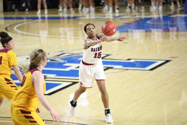 Oak Ridge junior Raja Eckles (15) passes the basketball during a 65-49 win over Science Hill in a Class AAA girls basketball tournament quarterfinal game in Murphy Center at Middle Tennessee State University in Mufreesboro on Thursday, March 7, 2019. (Photo by Luther Simmons)