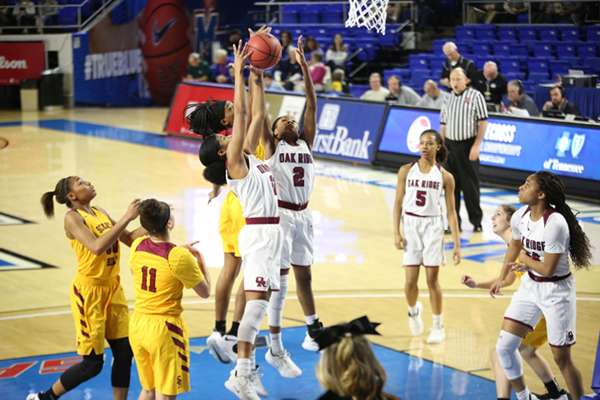Oak Ridge senior Shatyrah Copeland (22) and sophomore Khamari Mitchell-Steen (2) battle for a rebound during a 65-49 win over Science Hill in a Class AAA girls basketball tournament quarterfinal game in Murphy Center at Middle Tennessee State University in Mufreesboro on Thursday, March 7, 2019. (Photo by Luther Simmons)